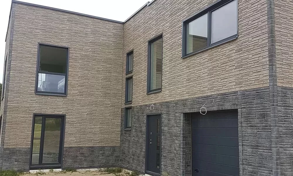 Фасадні панелі під камінь