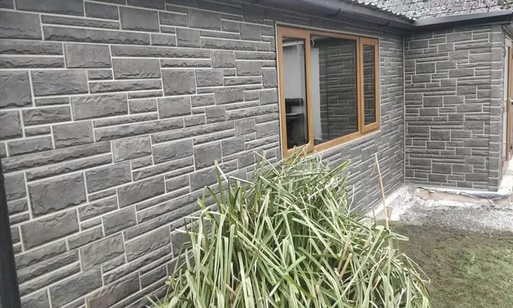 Фасадні панелі під камінь