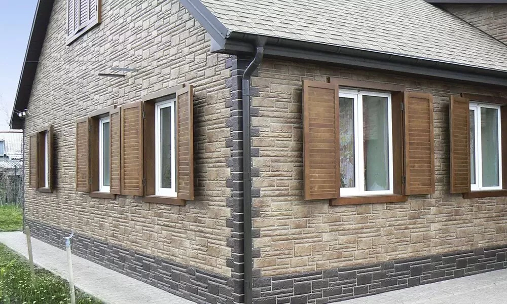 Фасадні панелі під камінь