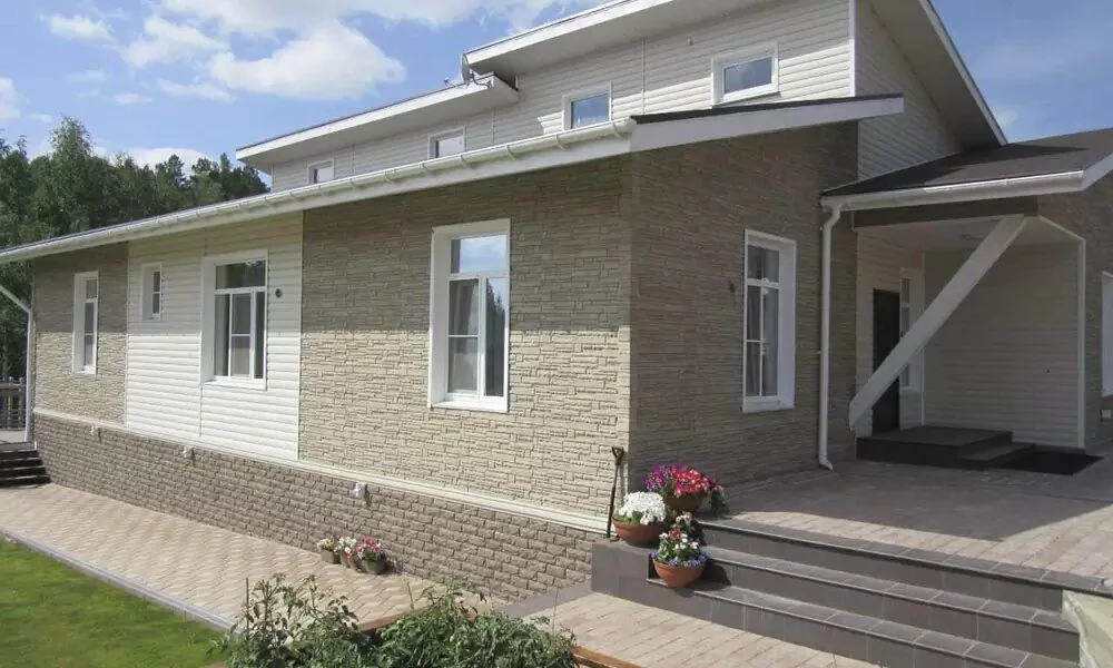 Фасадні панелі під камінь