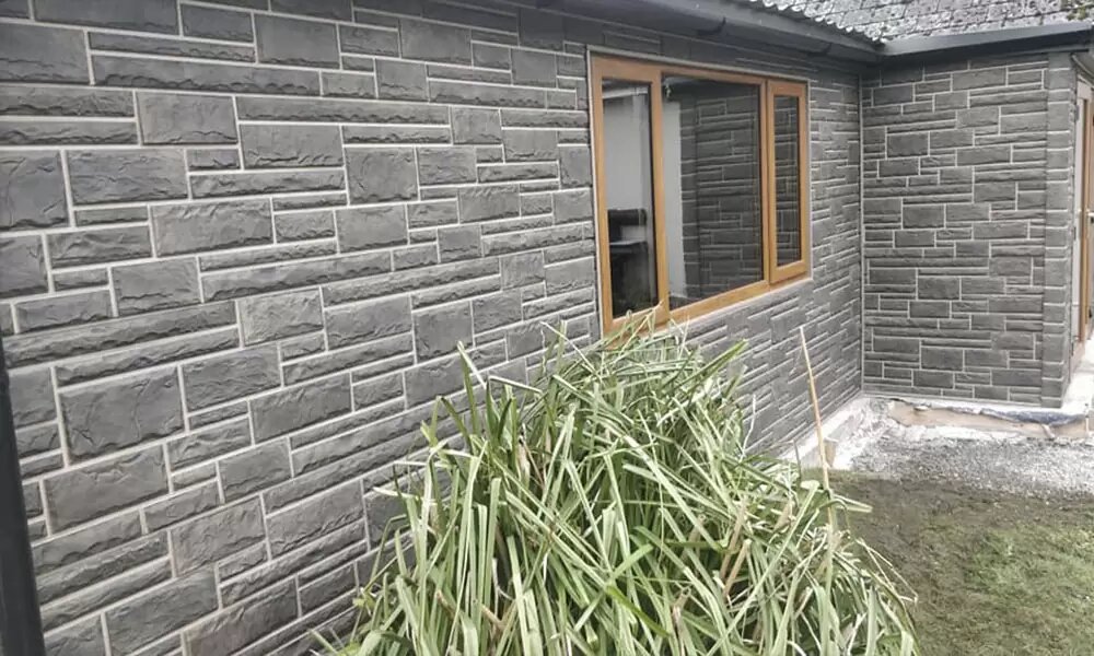 Фасадні панелі під камінь