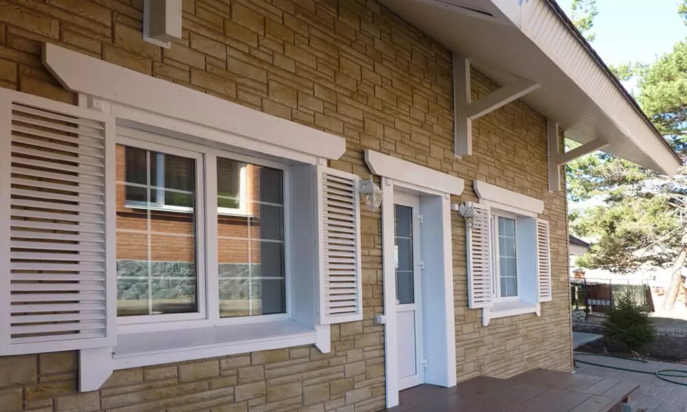 Фасадні панелі під камінь