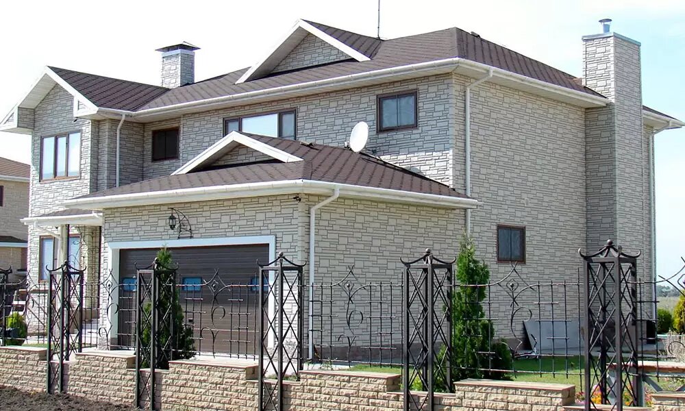 Фасадні панелі під камінь