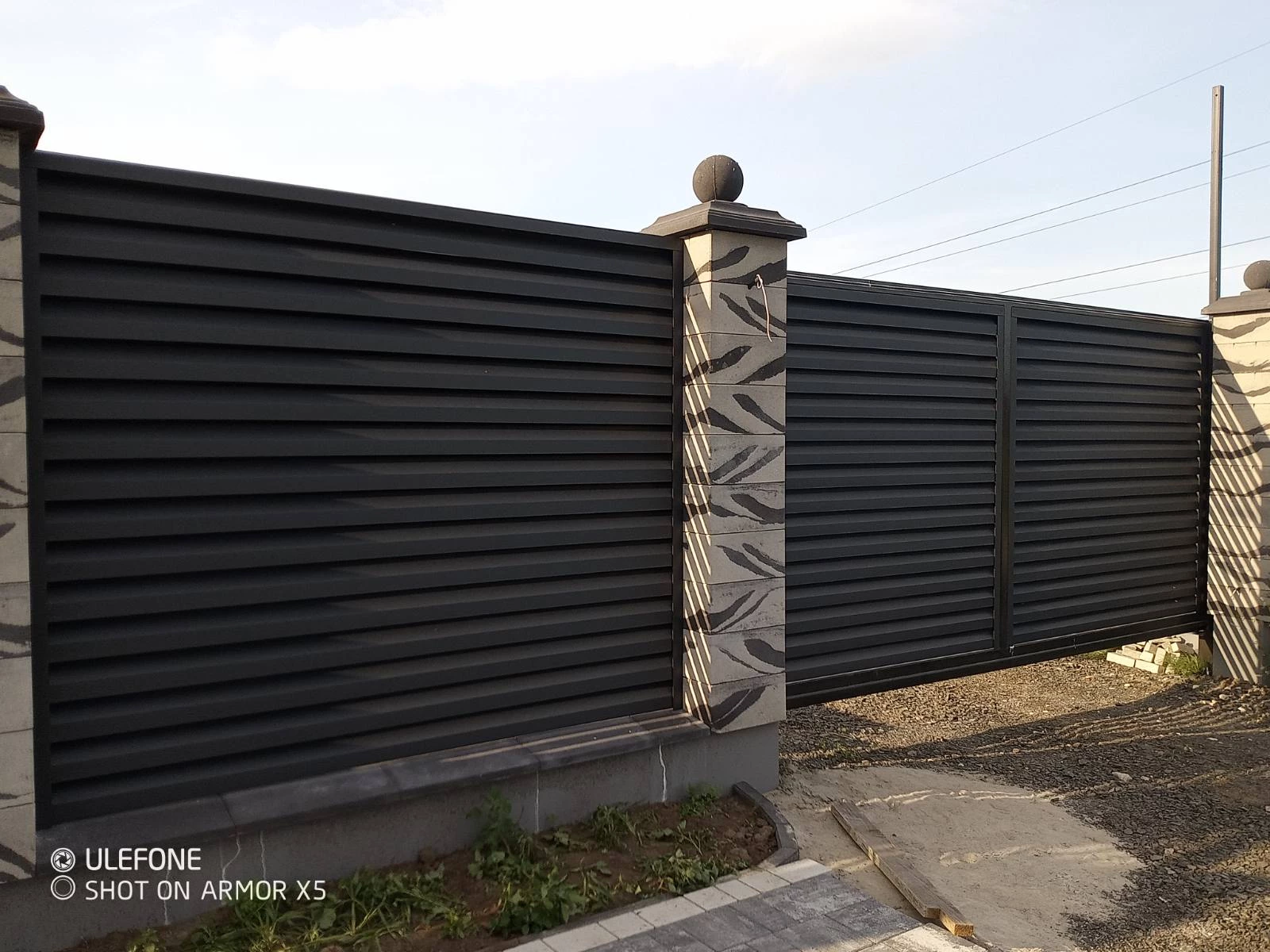 відкатні ворота фото ціна